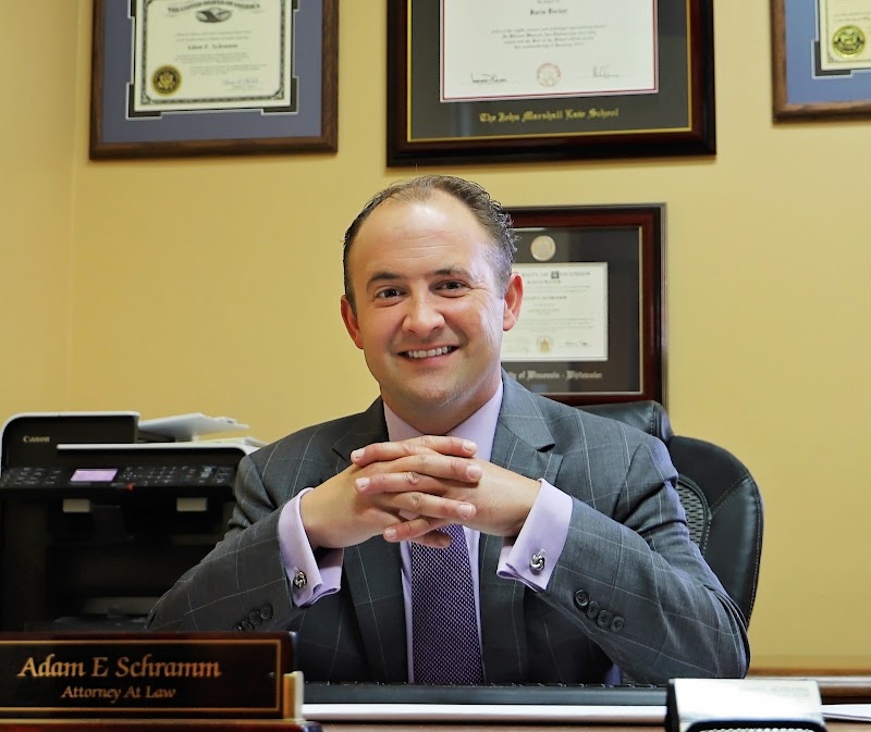Adam E. Schramm